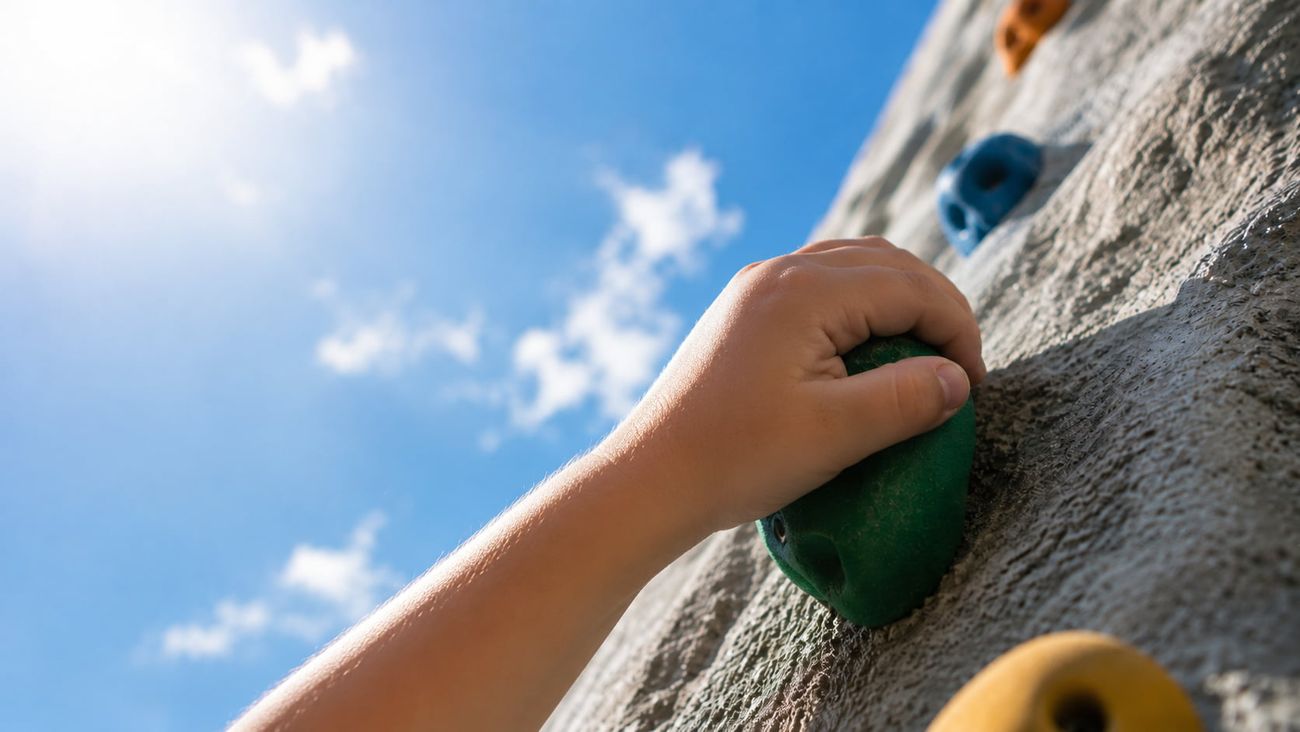 Child climbing on the mobile wall